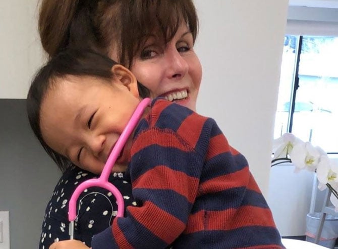 Nurse with baby patient
