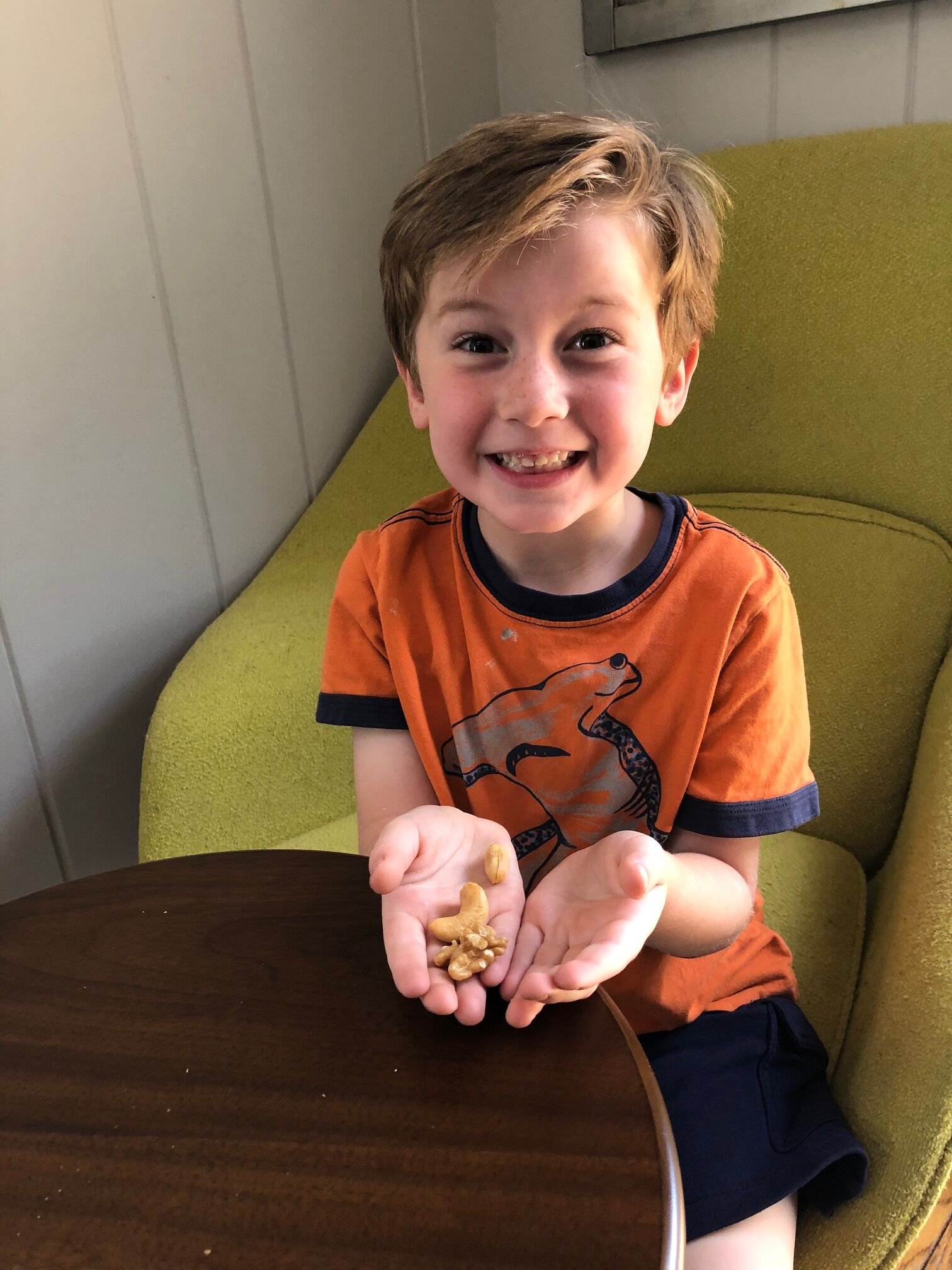 Collin with a hand full of nuts