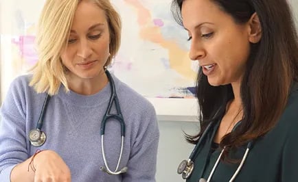 LAT_homepage_team_result two doctors engaging in a conversation